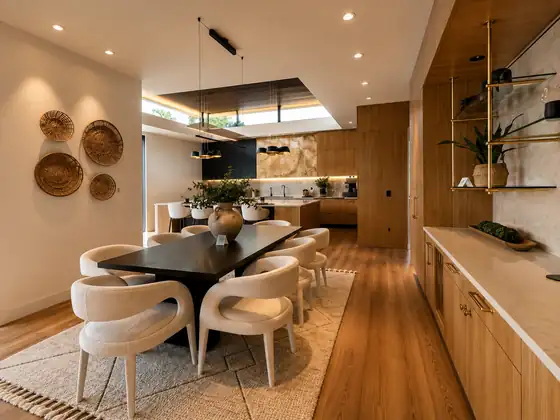 Open kitchen with wood cabinetry